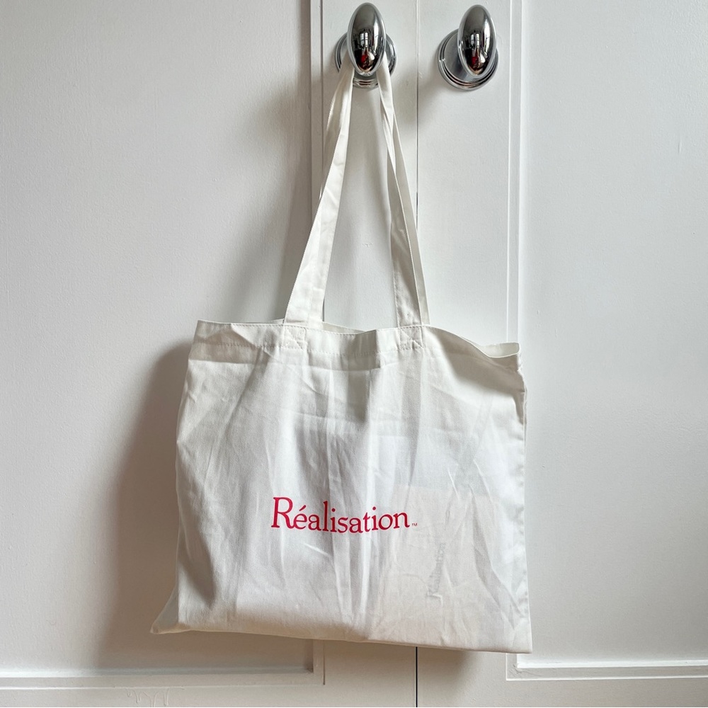 RÉALISATION PAR white tote bag